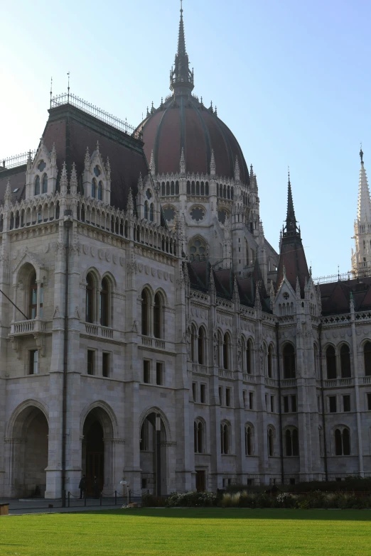 a big building that has many windows and some towers