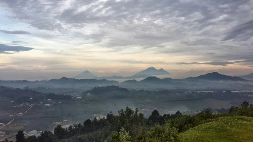 the countryside is dotted with mountains and valleys