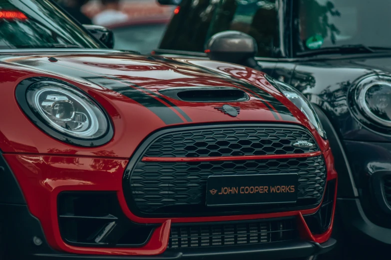 two new york mini coopers parked side by side