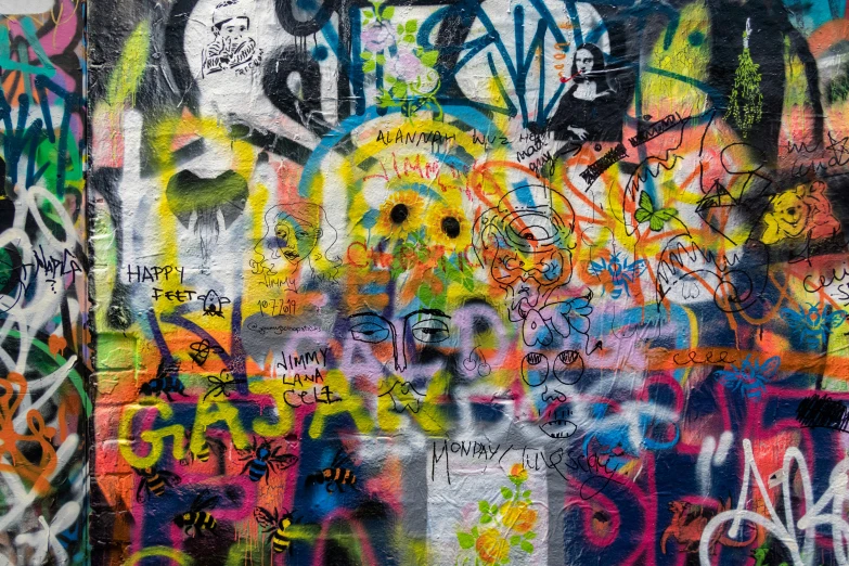 a building wall covered with a graffiti art work