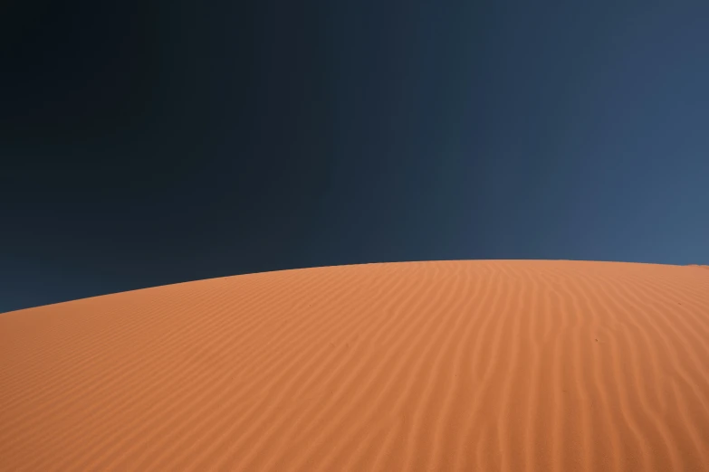 a desert dune is seen in this po