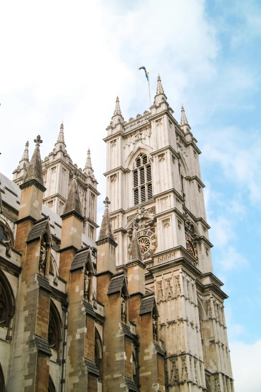 a large, stone cathedral stands at the top of a hill