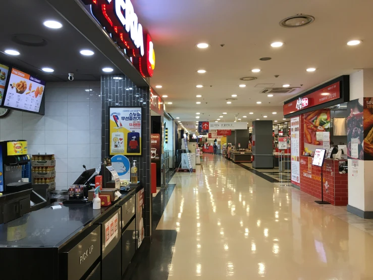 a picture of a busy food market with items in the store