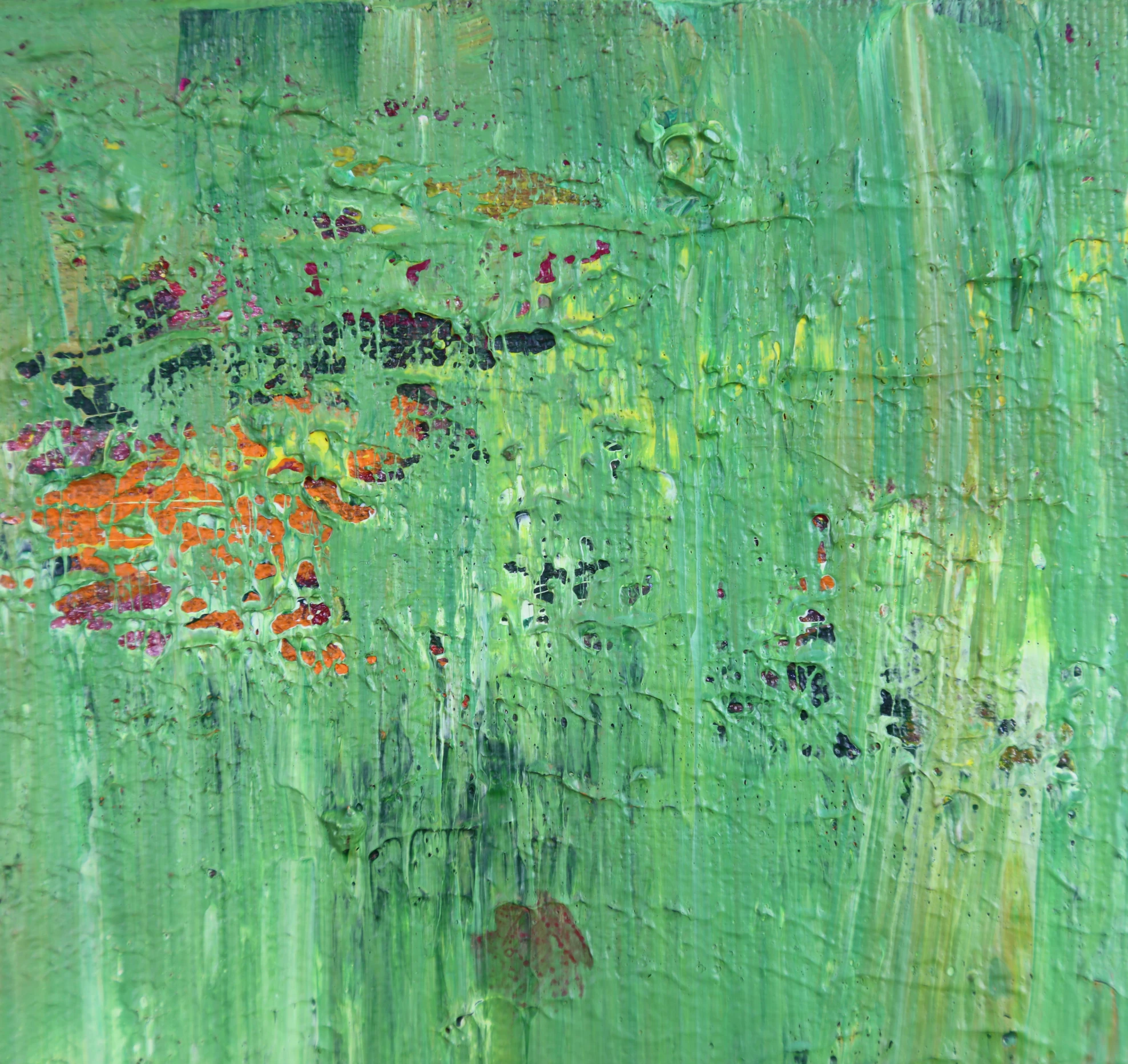 this painting shows a green with many small flowers on it