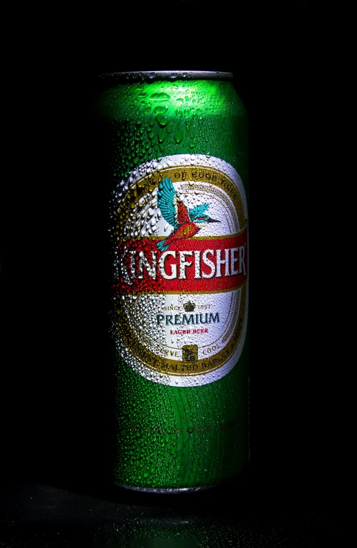 a green can of kingfish beer sits on a table