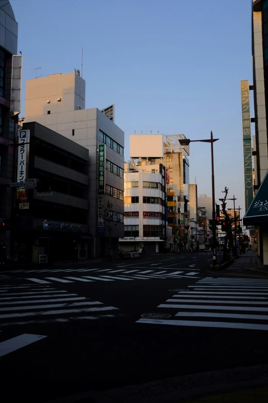 an empty intersection in a city street with no traffic