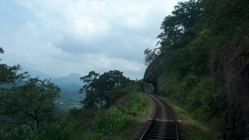 a very steep side with a long train track