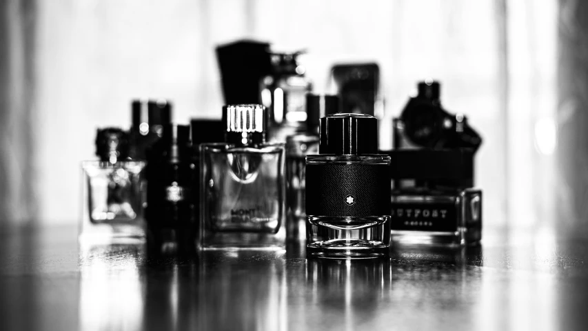 a counter filled with different types of perfumes