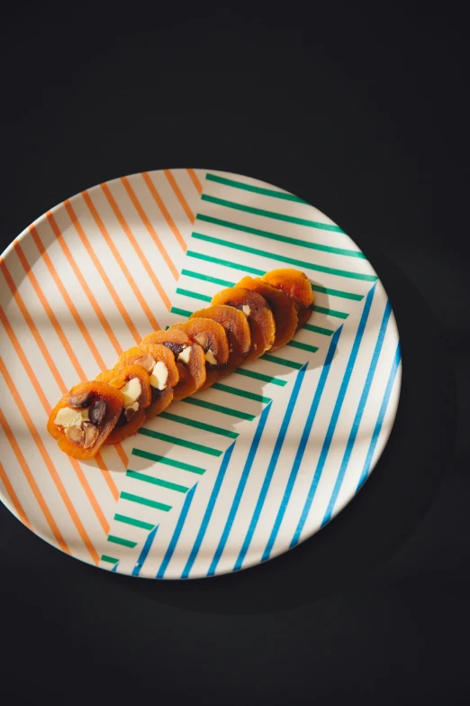 a plate with a piece of food on top