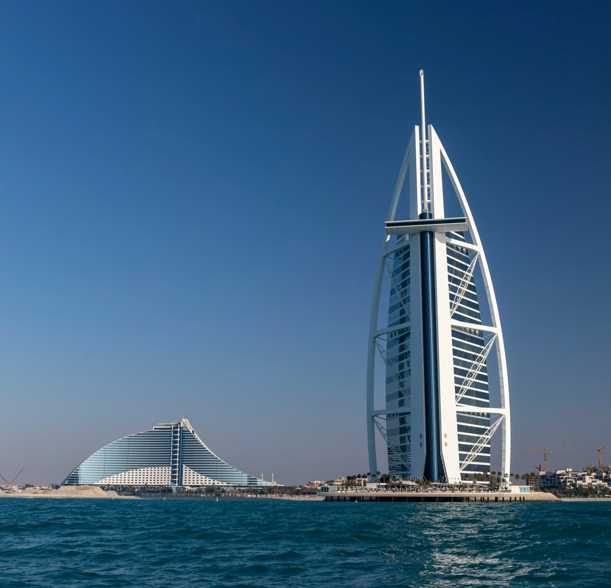 the burj el is located in the middle of a lagoon