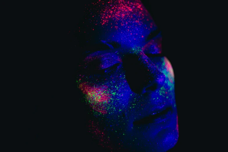 the black lights show how light appears on a person's face