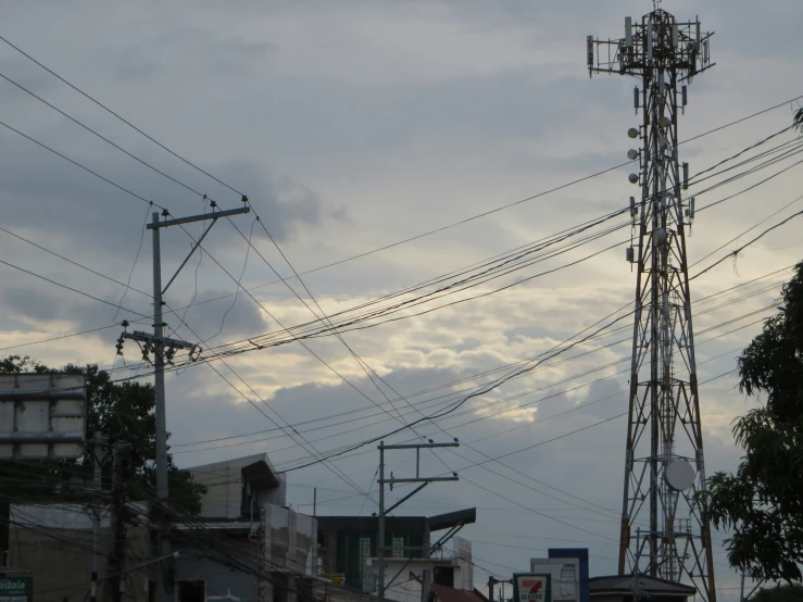 electrical lines running across the top of buildings