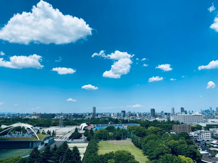 the sky is clear and blue with some clouds above