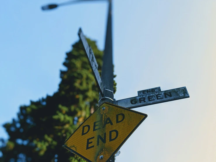 two street signs that are attached to one another