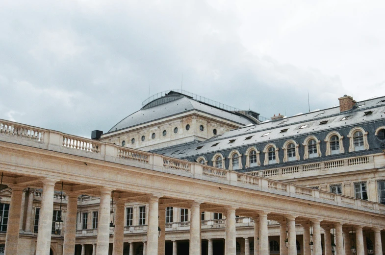 old and historic architecture is depicted with an overcast sky