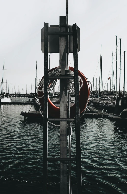 an artistic pograph of a boat dock with several sailboats