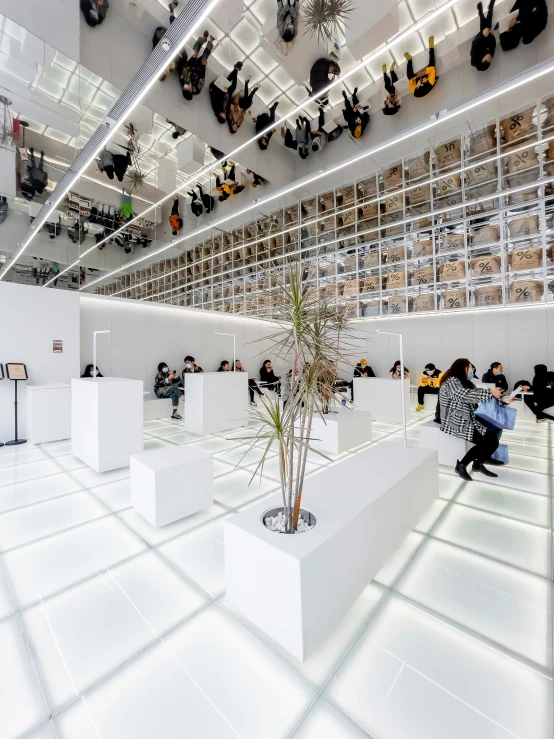 the interior of a building with lots of chairs