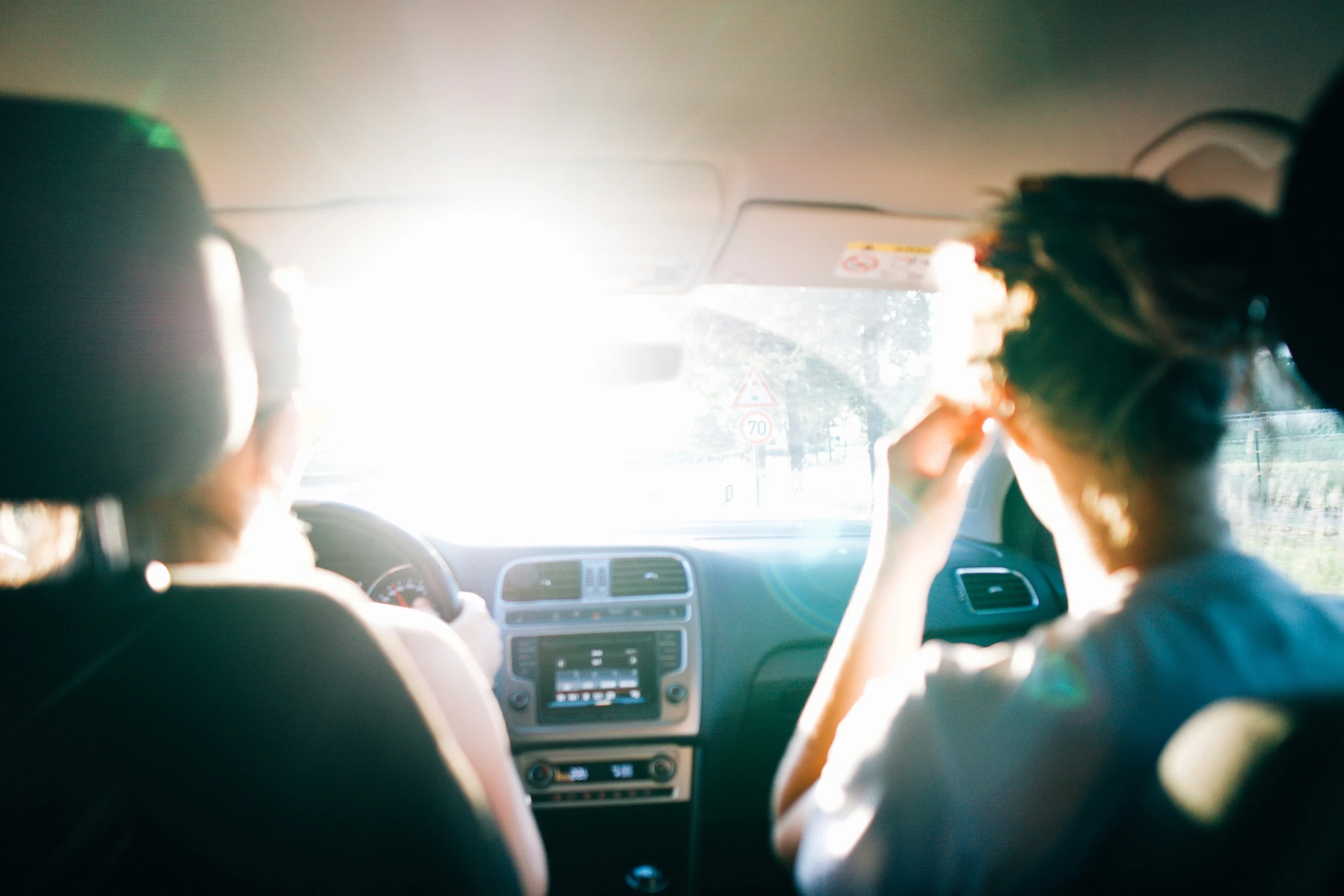 a view of the back seat in a vehicle from behind