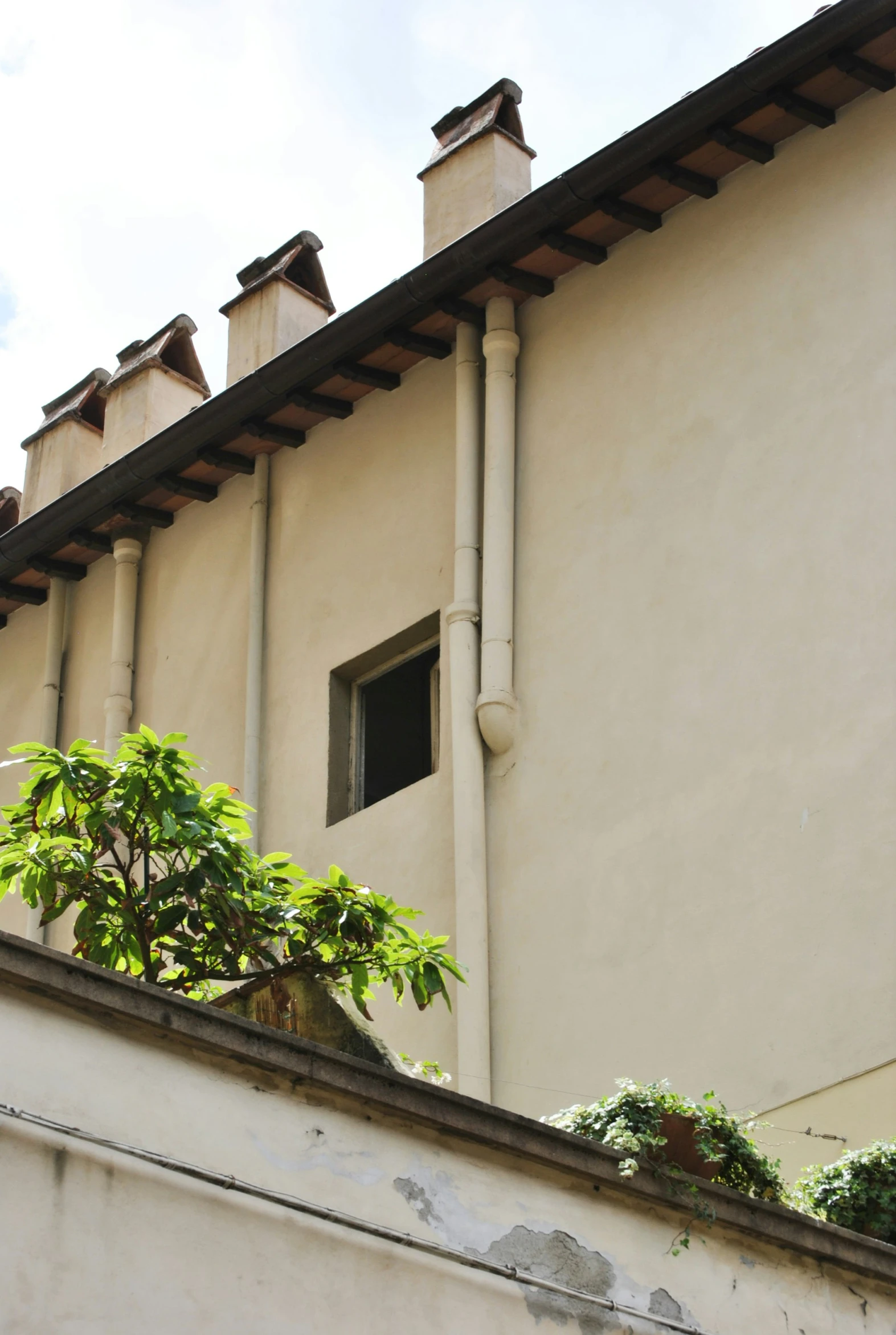 the windows on the building are made from brown wood