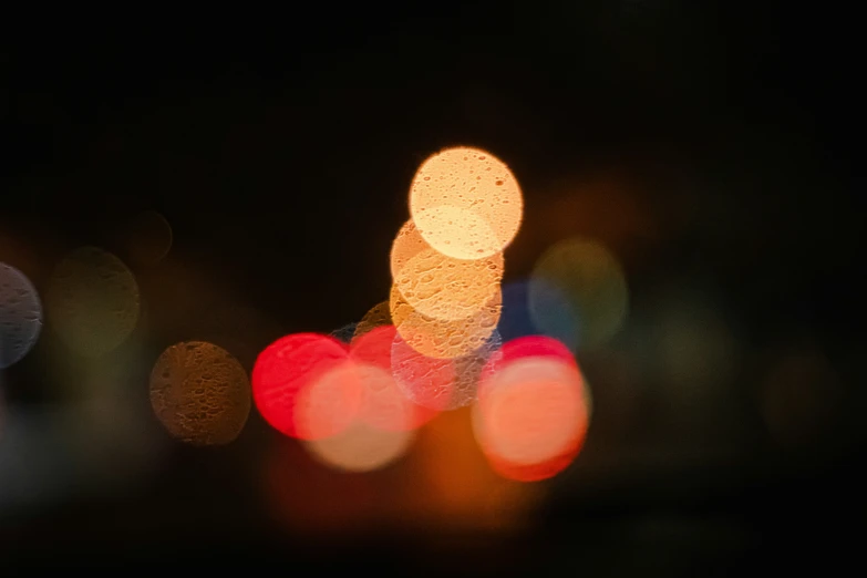 blurry pograph of street lights with a blurry boke