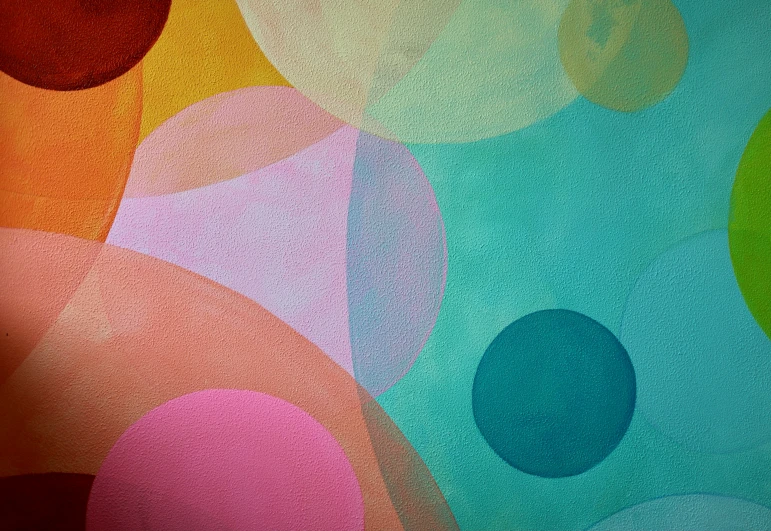 colorful bubbles and circles are featured on this abstract background