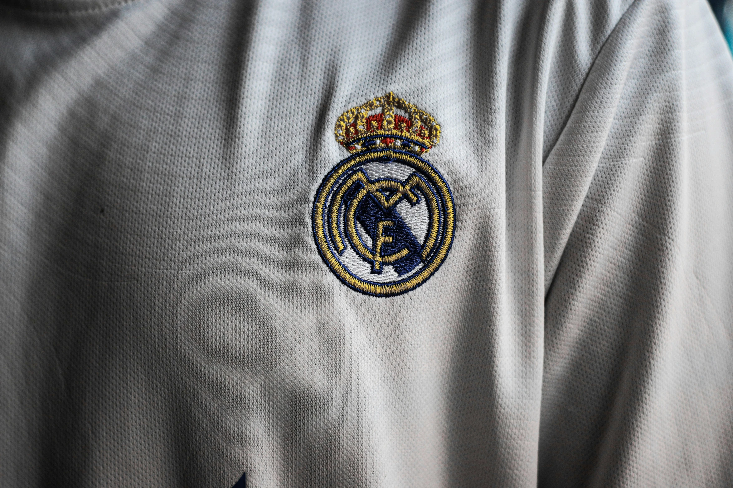 a close up of the shirt worn by the real madrid soccer club