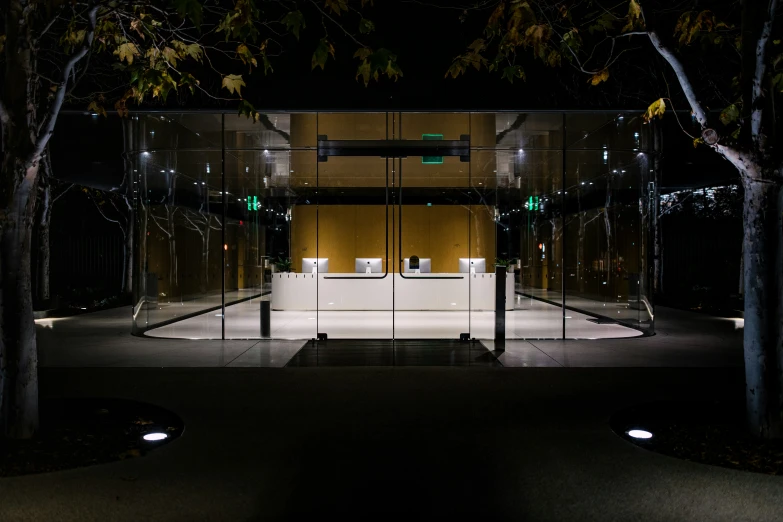 a dimly lit public restroom at night