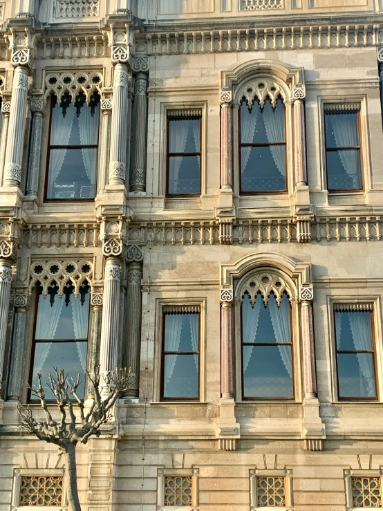 a window view of a building that has multiple windows