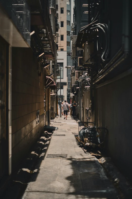 an alley lined with lots of building near one another