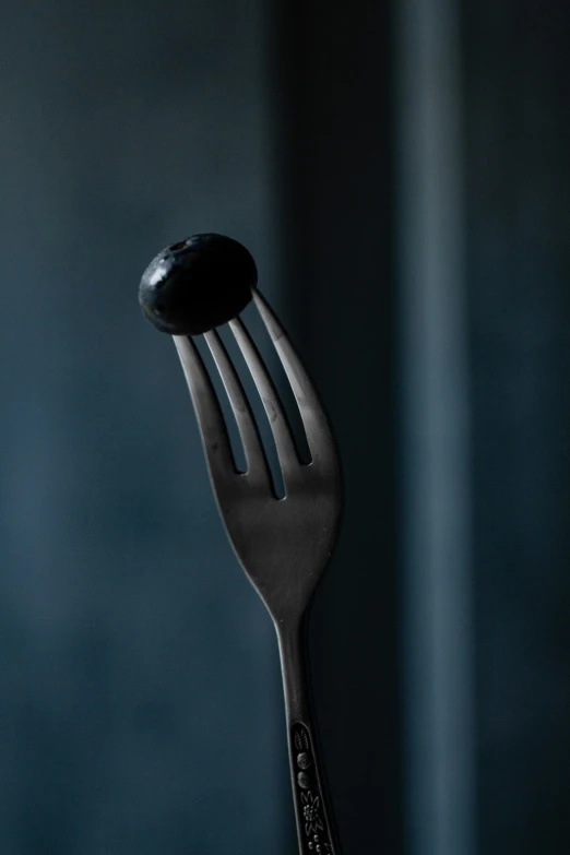 a fork with soing black and white on it