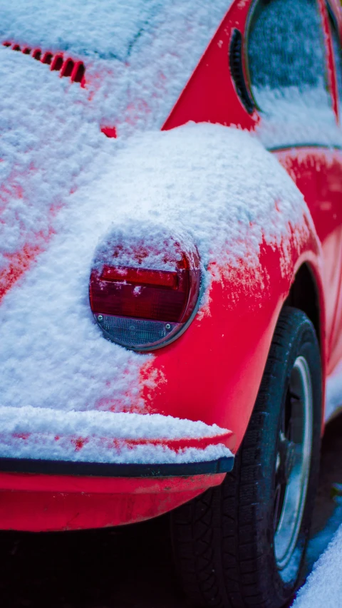 close up of a car covered with snow