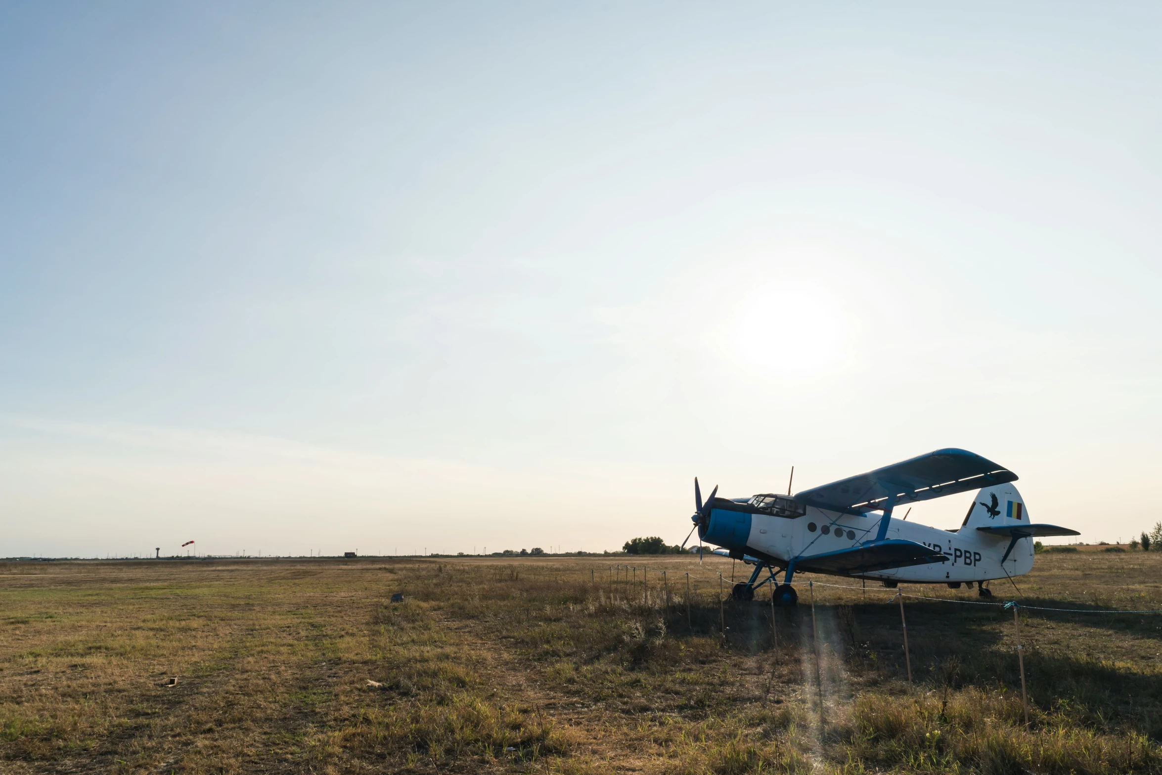 an old airplane is sitting in a field