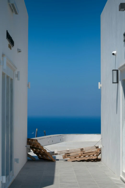 a view from a window on an ocean side building