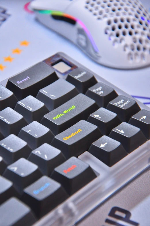 a black keyboard with colored keys and the letters a - z are marked