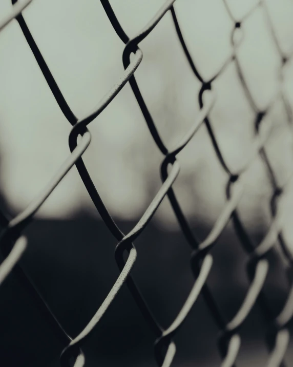 an up close image of a wire fence