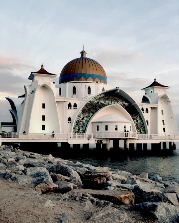 some domes over the water and on the pier