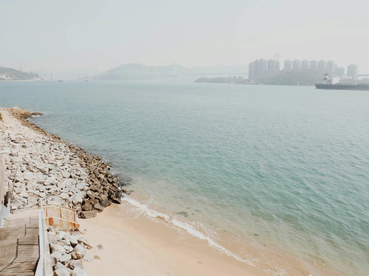 beach area with a beach side with ocean waves