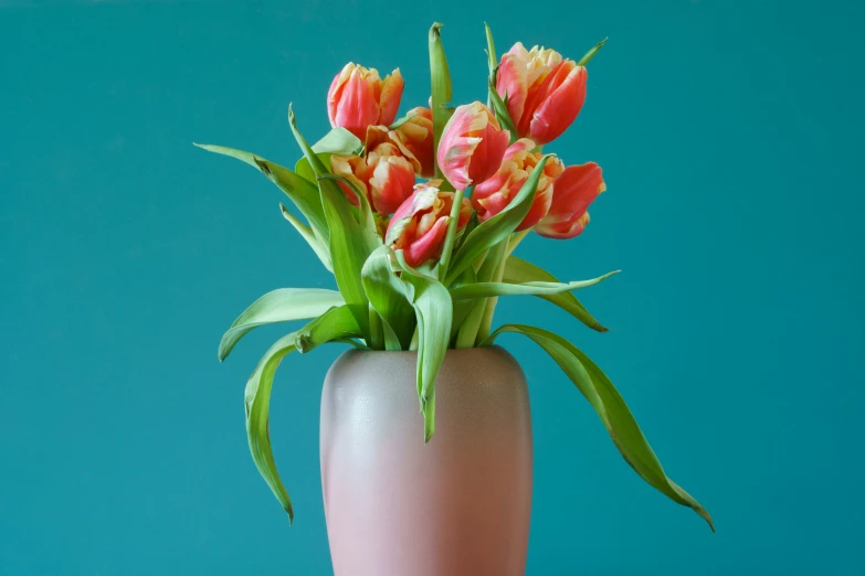 a vase with some flowers inside of it