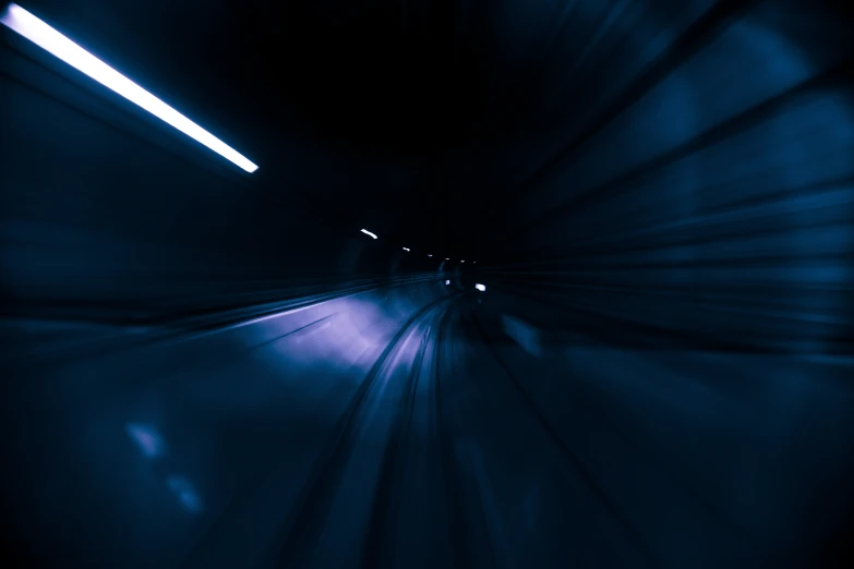 a tunnel with some lights in it