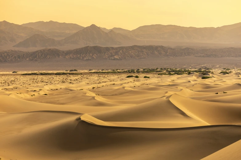 a very wide view of some tall mountains