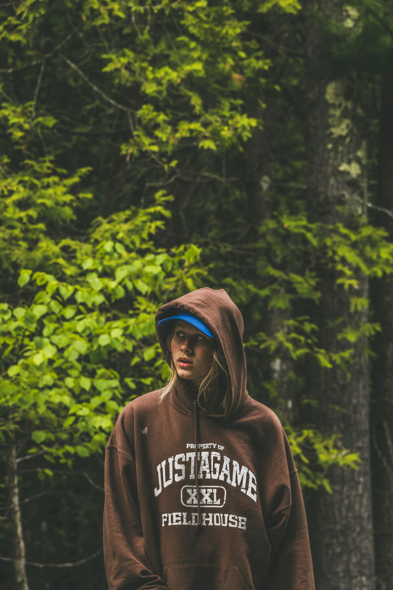 the hooded sweatshirt shows a hoodie and features a graphic that reads'just game or fail '