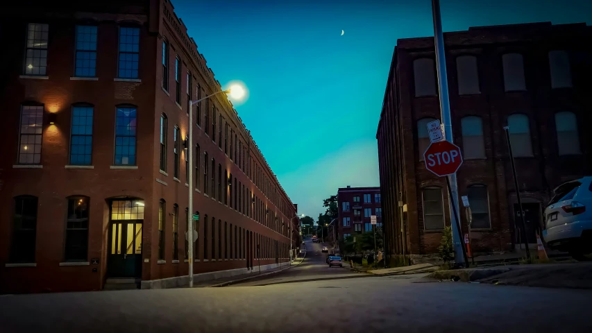 a city street with a stop sign on the corner