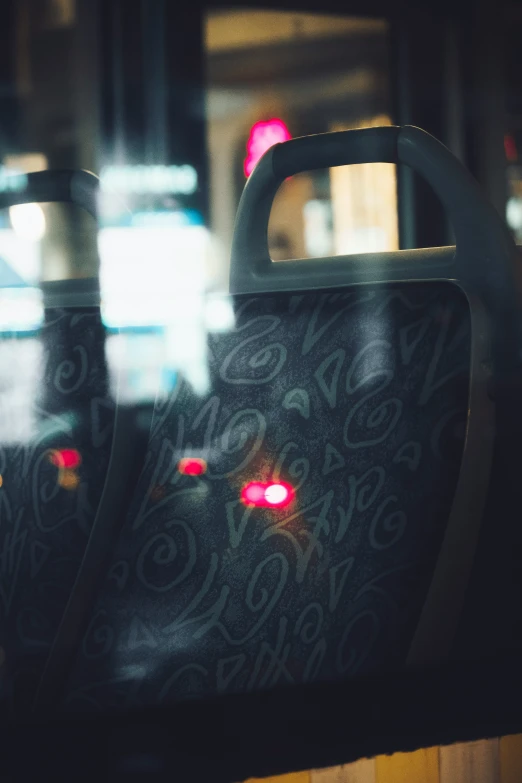 a po of a car's side window with the lights on