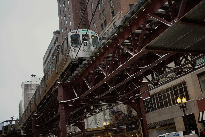 a train is riding on the steel bridge