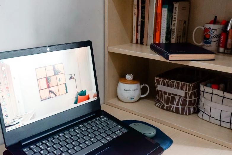 a laptop computer sits on top of a desk