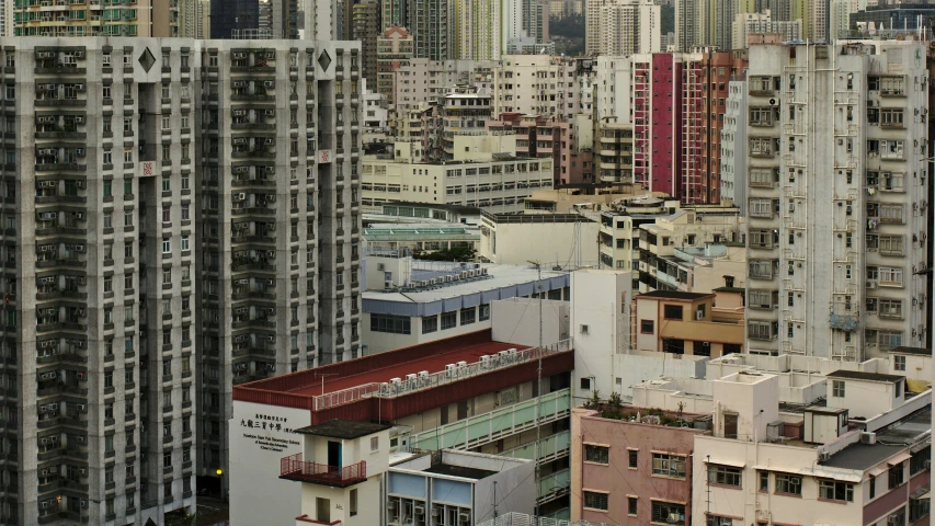 the cityscape shows all kinds of tall buildings