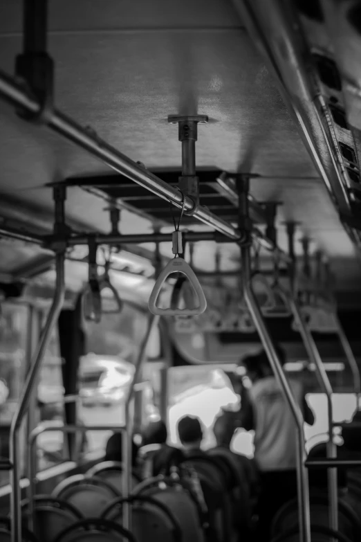 the inside of a public transit bus filled with people