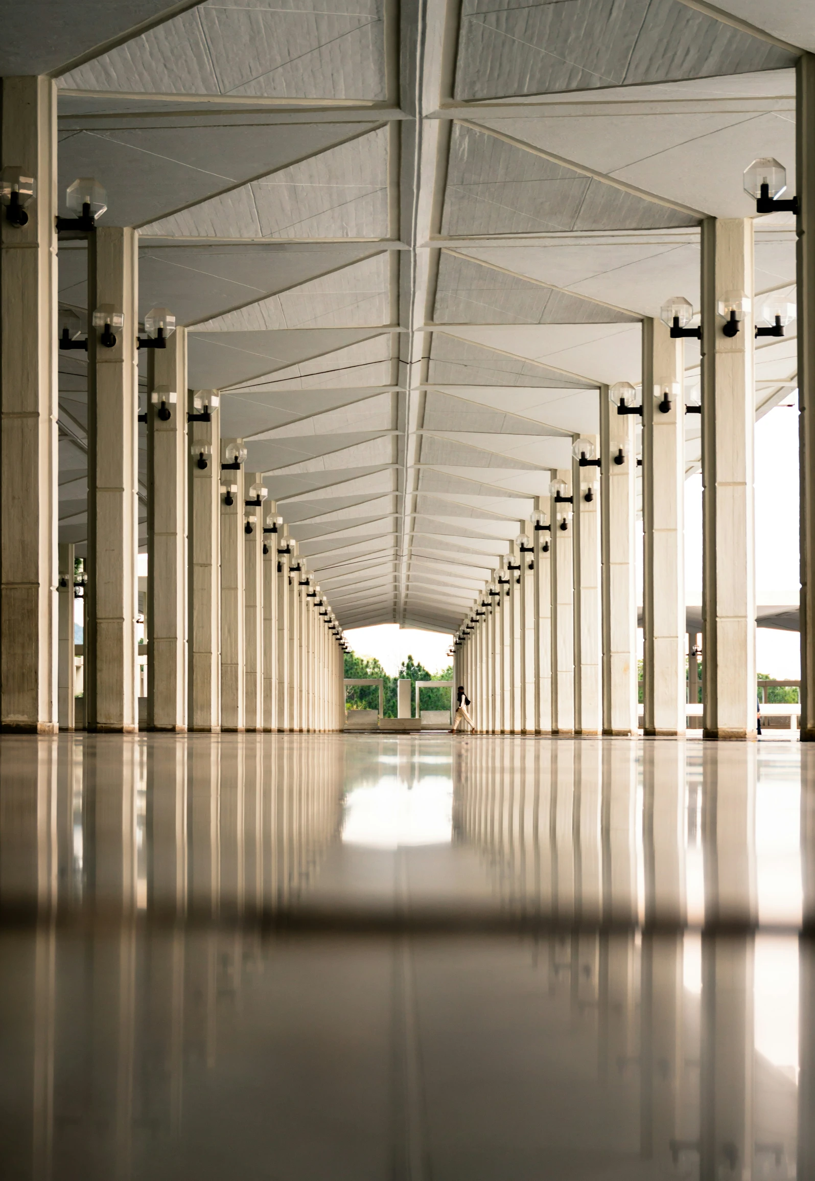 several pillars lined up on top of a floor