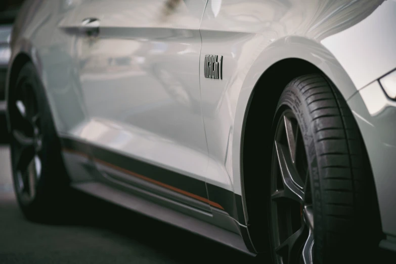 close up po of the taillights of a gray sports car