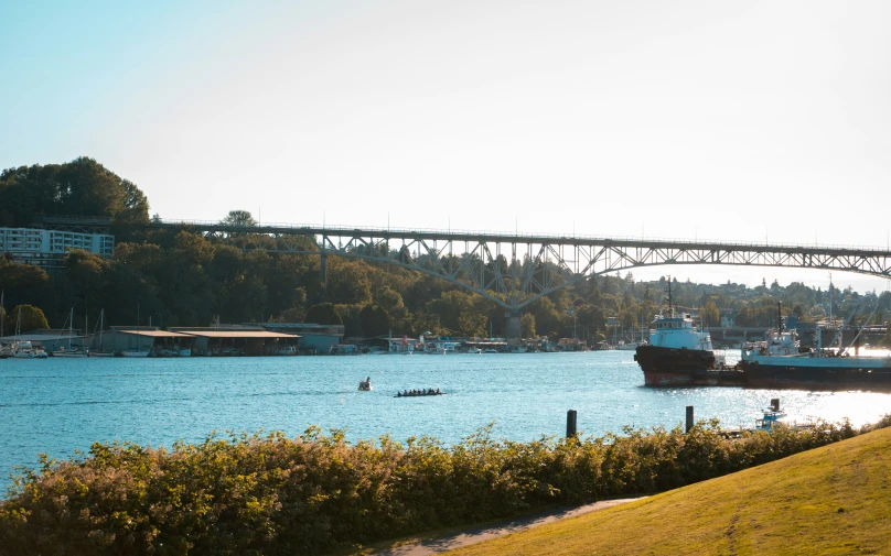 two boats in the middle of a large body of water